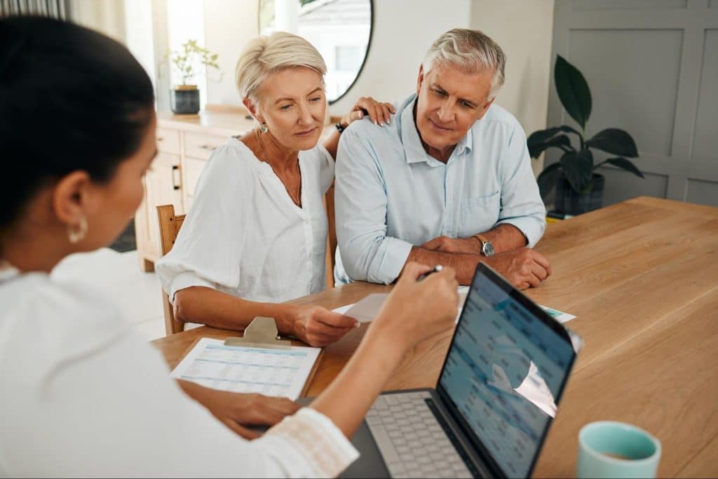 lawyer with clients at table